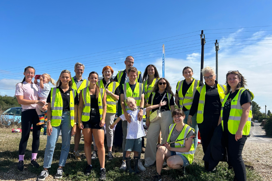 A group of MindWorks colleagues and family members at a beach clean with the Final Straw Foundation.
