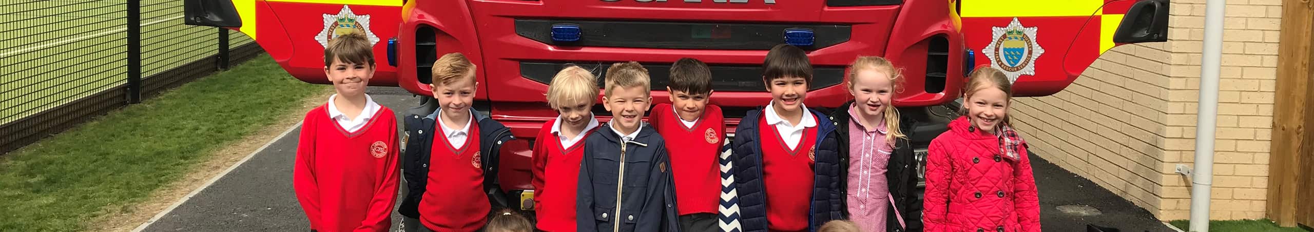 Chichester Free School children in fron of fire engine